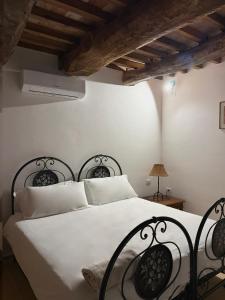 Giường trong phòng chung tại Agriturismo Al Vicinale