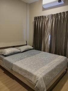 Ένα ή περισσότερα κρεβάτια σε δωμάτιο στο The lake Townhouse 3BR 3BA