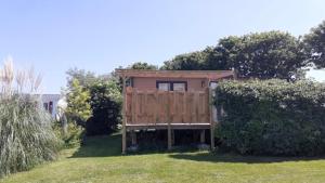 En have udenfor Mobil-home neuf -Au vert du jardin