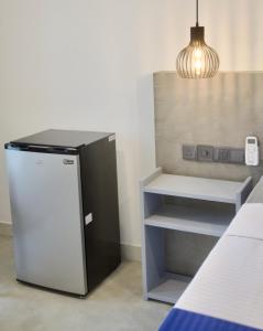 Ένα ή περισσότερα κρεβάτια σε δωμάτιο στο Mirissa Moments Hotel