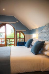 Postel nebo postele na pokoji v ubytování Casa Ecke-Frutillar bajo a una cuadra de la playa