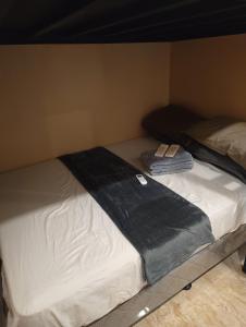 Ένα ή περισσότερα κρεβάτια σε δωμάτιο στο 1 BR Lumina Homes - Your Home Away From Home