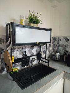 Η κουζίνα ή μικρή κουζίνα στο 1 BR Lumina Homes - Your Home Away From Home