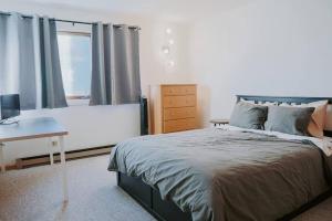 Ένα ή περισσότερα κρεβάτια σε δωμάτιο στο Mountain Escape in Fraser near Winter Park Trails