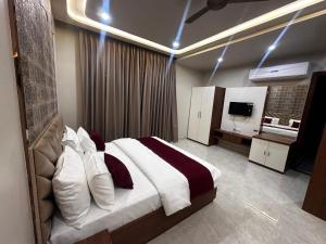 Postel nebo postele na pokoji v ubytování Ambassador Homestay - A Experiential Stay + 12 fotografií