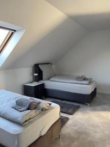 Postel nebo postele na pokoji v ubytování Haus am Osterholz