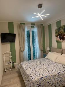 Postel nebo postele na pokoji v ubytování Profumo di Mare