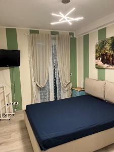 Postel nebo postele na pokoji v ubytování Profumo di Mare