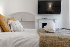 Ένα ή περισσότερα κρεβάτια σε δωμάτιο στο Seven Space - Pilgrims Rest, Cottage in Bacton