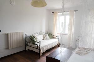 Ένα ή περισσότερα κρεβάτια σε δωμάτιο στο Holiday Home Camino Monferrato +37 φωτογραφίες