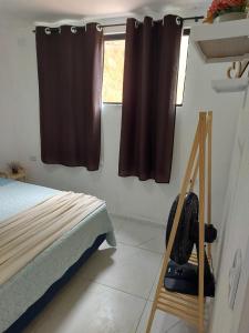 En eller flere senge i et værelse på Vila Negreiros Serra Negra Casa 1 + 11 billeder