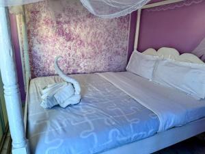 Ένα ή περισσότερα κρεβάτια σε δωμάτιο στο Paradise hotel +6 φωτογραφίες