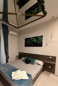 En eller flere senge i et værelse på Ladi House