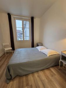 Postel nebo postele na pokoji v ubytování Budget Hôtel Weber - Strasbourg Centre Gare + 28 fotografií