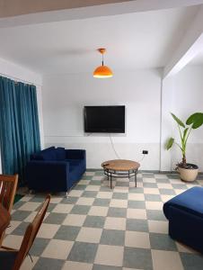 Μια τηλεόραση ή/και κέντρο ψυχαγωγίας στο Alojamiento Oroyte