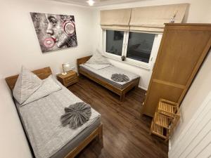 Ένα ή περισσότερα κρεβάτια σε δωμάτιο στο Handwerkerwohnung - Monteurunterkunft