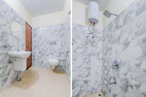 Ένα μπάνιο στο Hotel O Mapples Inn Palace