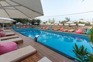 La alberca dentro o cerca de Hotel Memai Suites