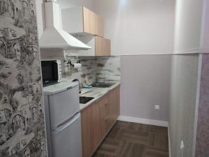 Η κουζίνα ή μικρή κουζίνα στο Weiße Wohnung