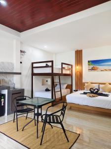 Ένα ή περισσότερα κρεβάτια σε δωμάτιο στο The Holiday Garden View