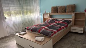 Ένα ή περισσότερα κρεβάτια σε δωμάτιο στο Horizont-360-Grad