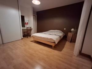 Postel nebo postele na pokoji v ubytování gite de la voie ferrée