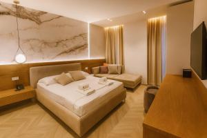 Μια τηλεόραση ή/και κέντρο ψυχαγωγίας στο Memai Suites