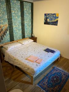 Ένα ή περισσότερα κρεβάτια σε δωμάτιο στο Rustichello G&P Tuscany