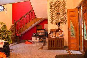 Et tv og/eller underholdning på Gods Own Homestay