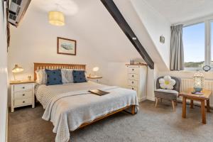 Postel nebo postele na pokoji v ubytování Beachcomber B&B