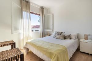 Postel nebo postele na pokoji v ubytování Casa Olivella #7 by Happy Houses Barcelona + 35 fotografií