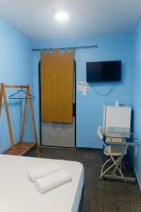 Μια τηλεόραση ή/και κέντρο ψυχαγωγίας στο Alvorada Suite +20 φωτογραφίες