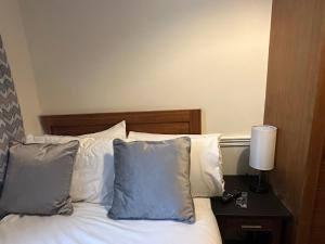 Кровать или кровати в номере Hotel Cavendish