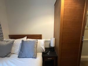 Кровать или кровати в номере Hotel Cavendish