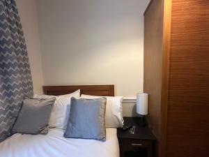Кровать или кровати в номере Hotel Cavendish
