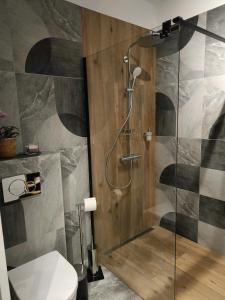 Ένα μπάνιο στο MODERN APARTAMENT Walendów Park