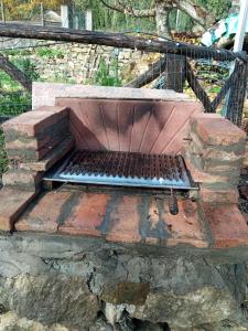 a bench sitting on top of a pile of bricks at La caciaia di Bulcianella in Pieve Santo Stefano