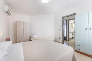 Ένα ή περισσότερα κρεβάτια σε δωμάτιο στο casa relax