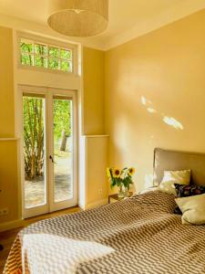 Ένα ή περισσότερα κρεβάτια σε δωμάτιο στο Idyllic Vacation Home In The Elbe Floodplains