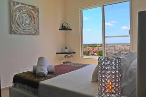 Giường trong phòng chung tại Luxury 3 bedroom 2 bath Lagoon view condo +20 ảnh