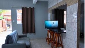Et tv og/eller underholdning på Residencial Vila Marambaia Itacaré