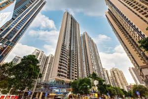 Nespecifikovaný výhled na destinaci Kanton nebo výhled na město při pohledu z aparthotelu