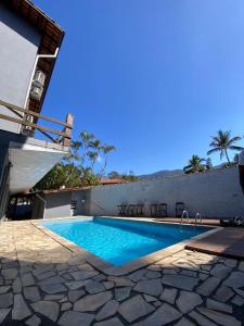 Πισίνα στο ή κοντά στο Studio 23 da praia de Maresias