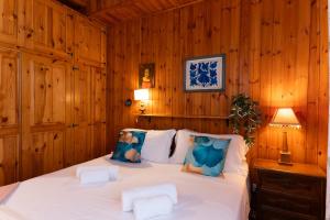 Ένα ή περισσότερα κρεβάτια σε δωμάτιο στο Sci a 10 Min! Chalet in Legno, Roccaraso Centro