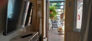 TV a/nebo společenská místnost v ubytování Ríos que nos unen