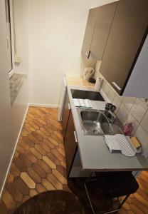 Η κουζίνα ή μικρή κουζίνα στο Le cœur d'Arras 1