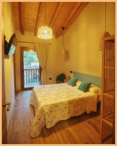 Postel nebo postele na pokoji v ubytování Casín hostel