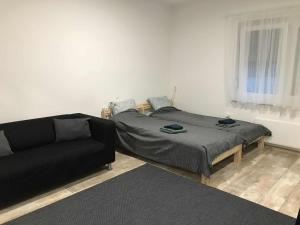 Giường trong phòng chung tại Huszonnyolcpera