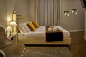 Una cama o camas en una habitación de Albergo Diffuso Birkin Castello