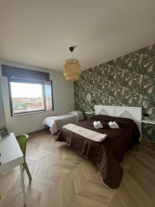 Ένα ή περισσότερα κρεβάτια σε δωμάτιο στο B&B La Rotonda